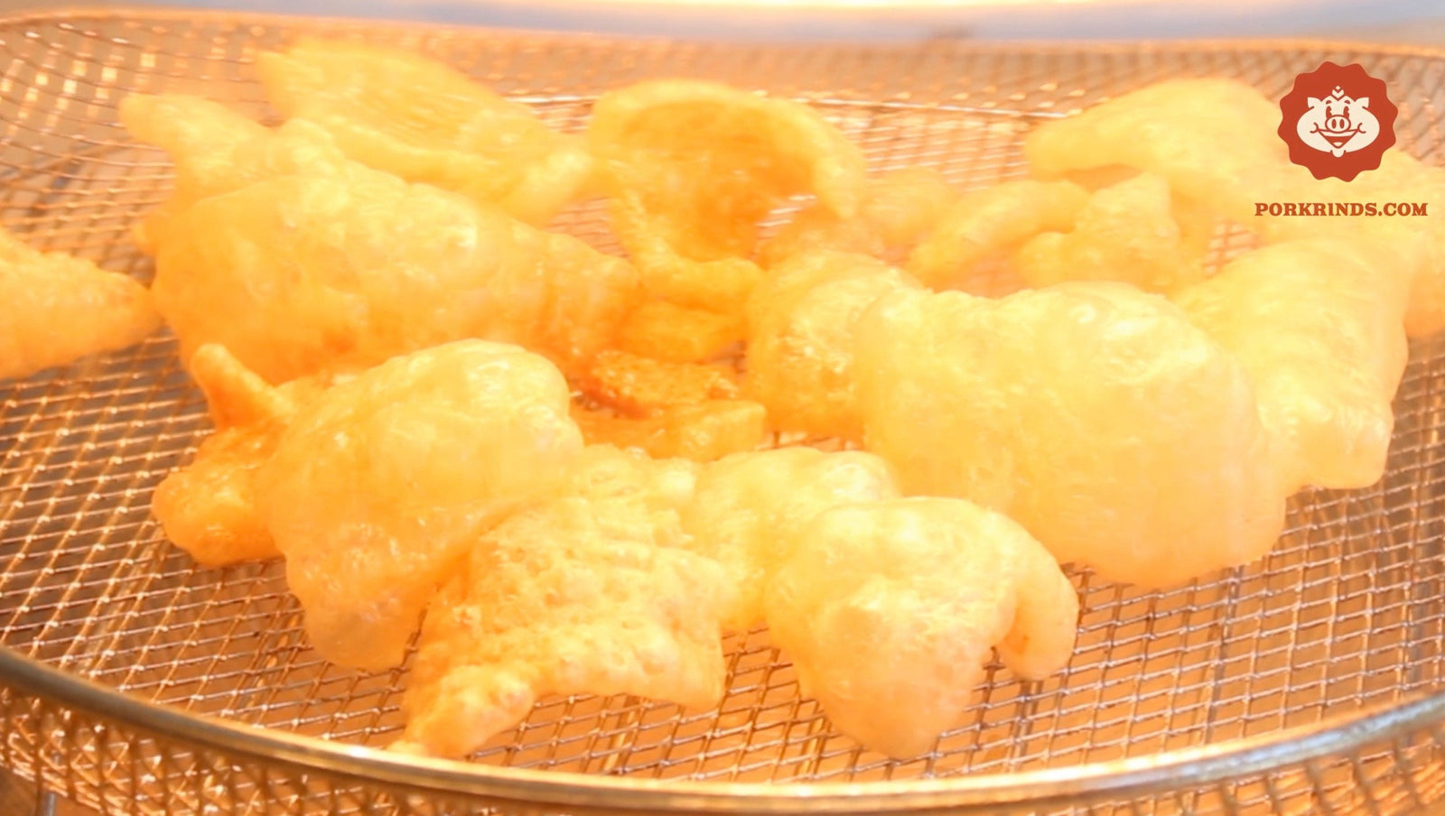 Pork rinds cooking in an air fryer